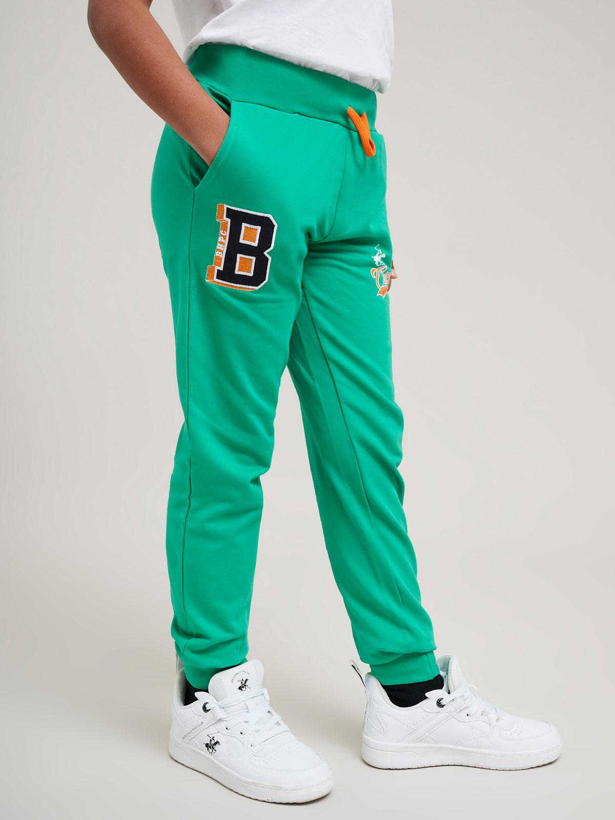 Green and orange joggers on sale